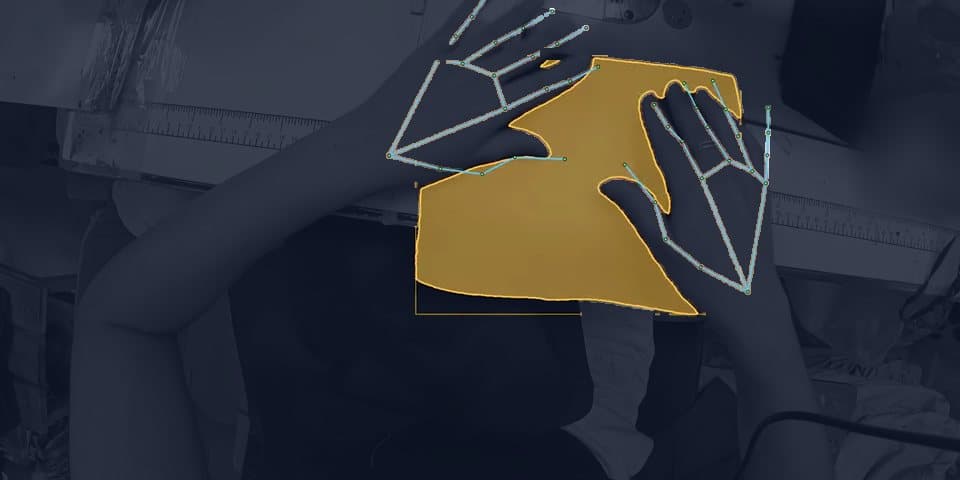 Hand keypoints, the fabric mask and its bounding box drawn over a dimmed copy of the frame